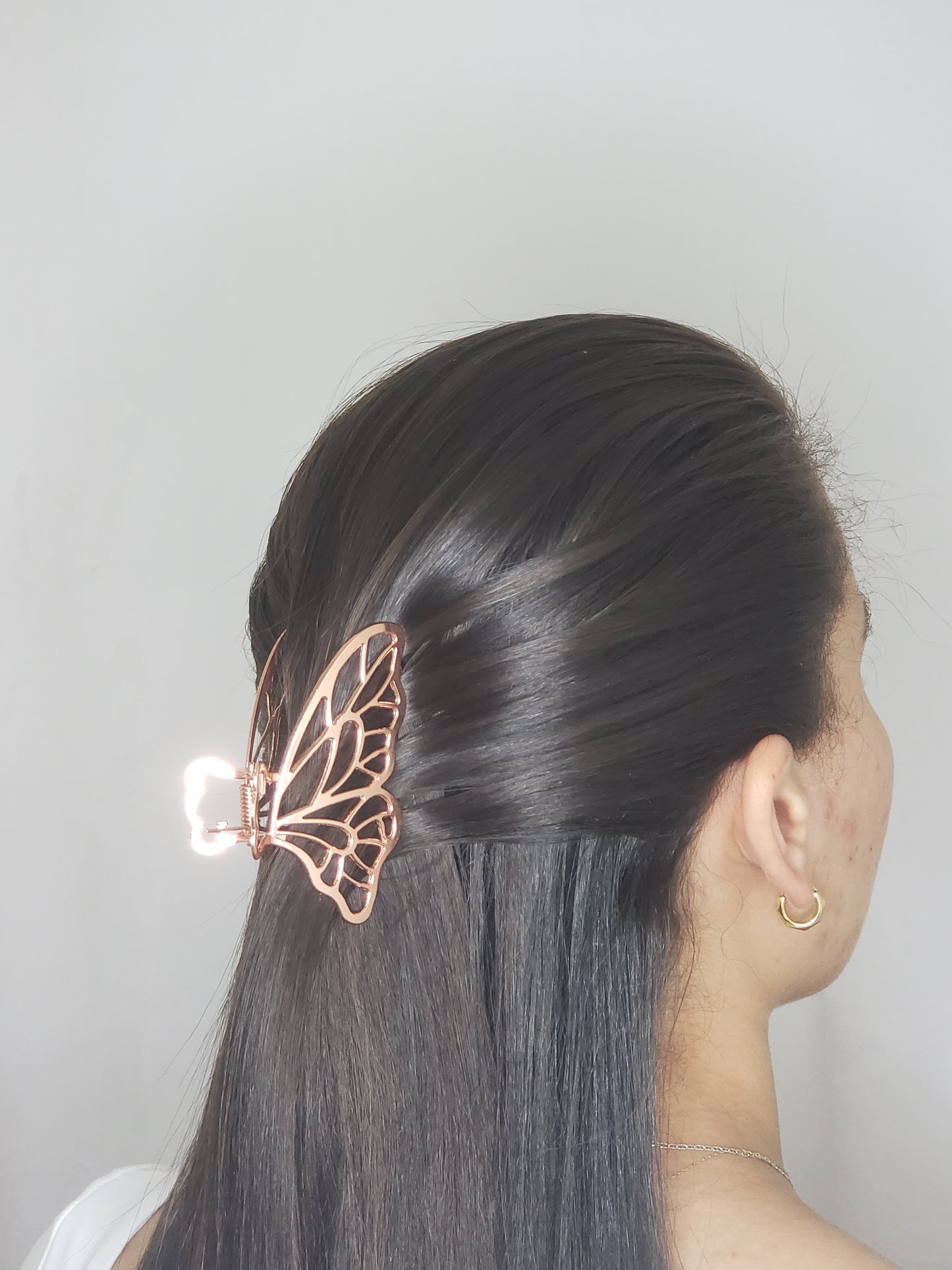 Pinza de pelo de mariposa.